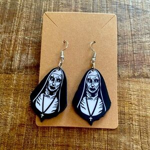 The Nun earrings.